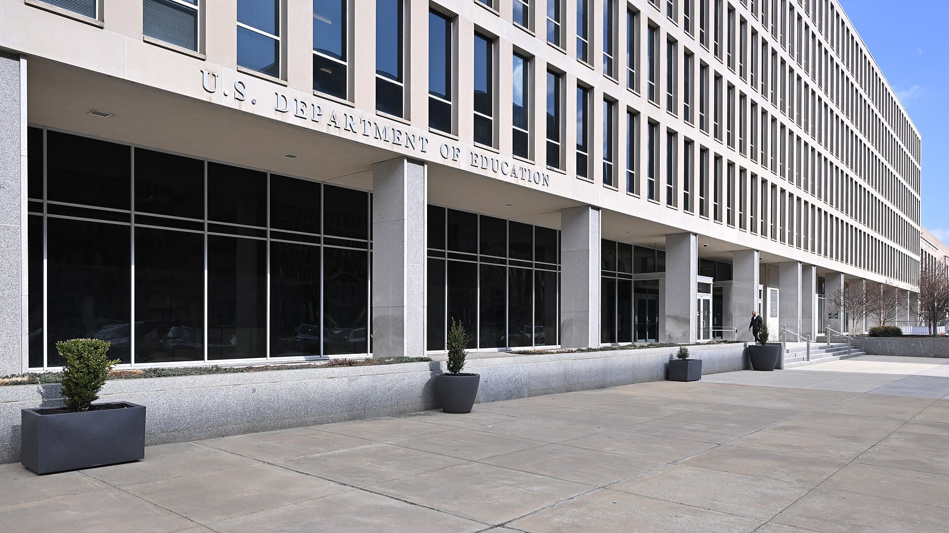 The stone facade of the U.S. Department of Education headquarters with the agency's name carved above the entrance